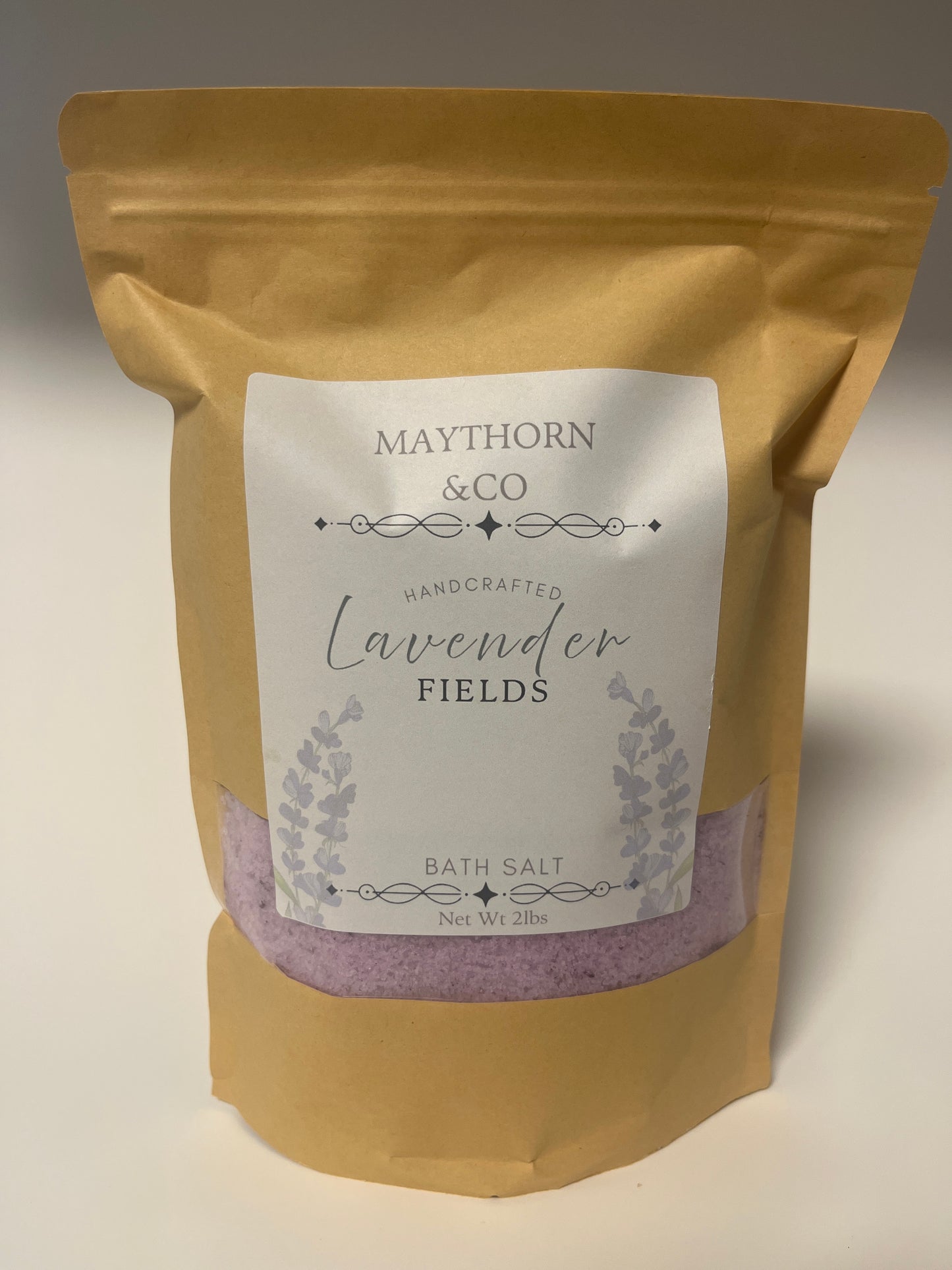 Lavender Fields bath salt by Maythorn & Co in a glass jar with lavender flowers and salt crystals, ideal for relaxing baths.
