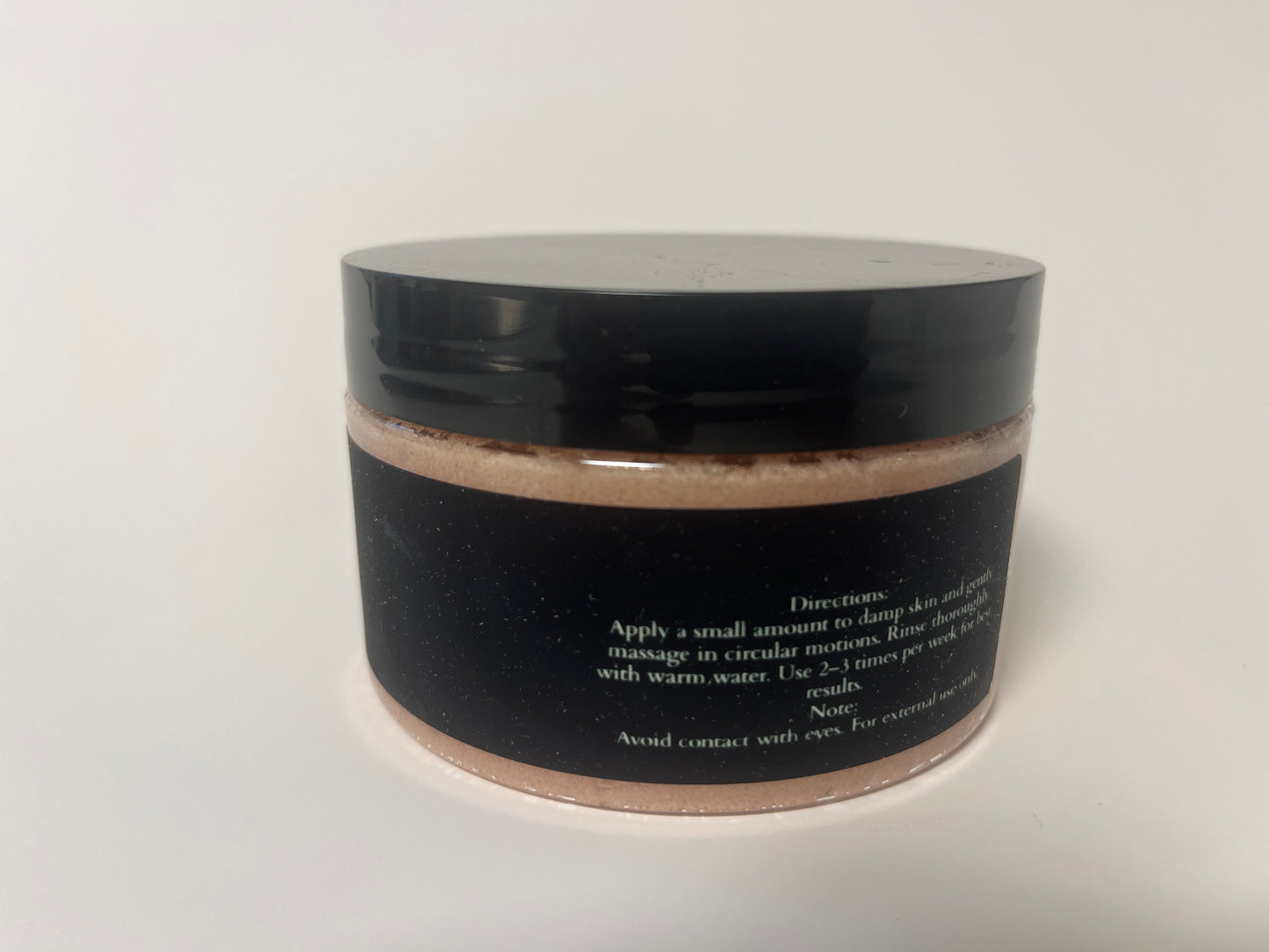 Maythorn & Co warm vanilla body scrub jar with textured scrub and vanilla scent, close-up view of the product container.