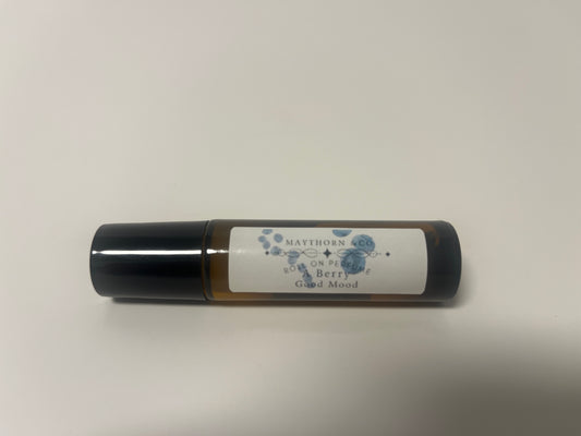 Maythorn & Co Berry Good Mood roll-on perfume bottle with a clear rollerball and colorful berry-themed label.