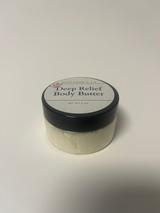Maythorn & Co Deep Relief Body Butter jar with a natural, creamy texture and herbal ingredients visible in the image.
